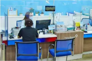  ?? VNA/VNS Photo Trần Việt ?? A Vietinbank branch in Hà Nội. This year, deposit interest rates are expected to rise by 0.3-0.5 percentage points to 5.9-6.1 per cent.