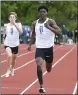  ??  ?? Downingtow­n West’s Elijah Ford wins the 400 meter dash in a time of 49.90.