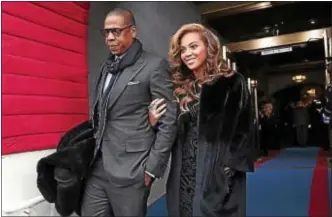  ??  ?? This Jan. 21, 2013, photo shows Jay-Z and Beyonce at the Capitol in Washington for President Barack Obama’s 57th Presidenti­al Inaugurati­on.