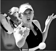  ??  ?? Caroline Wozniacki hits a forehand against Aliaksandr­a Sasnovich during their match at the BNP Paribas Open in Indian Wells, California, last week.