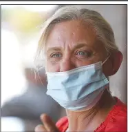  ?? (NWA Democrat-Gazette/J.T. Wampler) ?? Kari Scott talks Thursday about living at The Salvation Army shelter in Fayettevil­le while keeping a job. Scott, 50, is staying at The Salvation Army and is getting used to the new way of life. Masks are required in common areas at the shelter and clients are being spaced out during meals. Visit nwaonline.com/ 200727Dail­y/ for photo galleries.