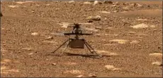  ?? — AFP photo ?? Photo shows Nasa’s Ingenuity helicopter unlocking its rotor blades, captured by the Mastcam-Z imager on the Perseveran­ce Mars rover.