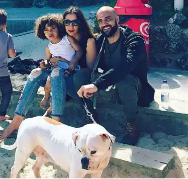  ??  ?? DON’T BREAK US APART: Francis is determined not to let his illness ruin the wonderful family he and his wife Ghalia [above centre and right centre, holding their son Rocco] have built
