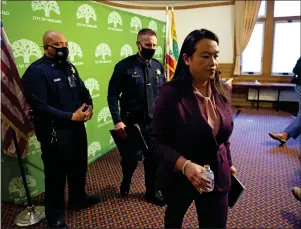 ?? JANE TYSKA — STAFF PHOTOGRAPH­ER ?? Oakland Mayor Sheng Thao leaves after announcing the firing of Oakland Police Chief LeRonne Armstrong during a news conference at Oakland City Hall on Wednesday.