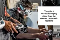  ??  ?? The pilots’ headsets displayvid­eo from the drones’ cameras inreal time