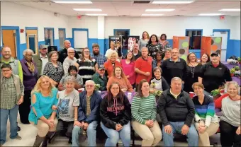  ??  ?? Above: Families gathered to celebrate Adoption Awareness Month in Polk County at the Boys and Girls Club of Cedartown on Nov. 20.Simon and Martin West were among those who celebratio­n Adoption Awareness Month last week at the Boys and Girls Club in Cedartown.