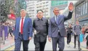  ?? AP ?? Impersonat­ors of US President Donald Trump, North Korean leader n Kim Jong Un and former US President Barack Obama walk together at an event in Hong Kong.