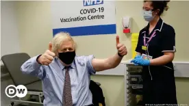  ??  ?? Britain's Prime Minister Boris Johnson gestures after receiving the first dose of the AstraZenec­a vaccine