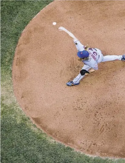  ?? AP PHOTOS ?? Noah Syndergaar­d’s last start was May 25 against the Brewers in Milwaukee.