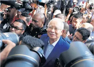  ?? REUTERS ?? Malaysia’s former prime minister Najib Razak arrives to give a statement to the Malaysian Anti-Corruption Commission in Putrajaya yesterday.