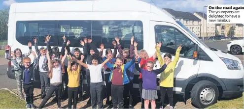  ??  ?? On the road again The youngsters are delighted to have a new minibus
