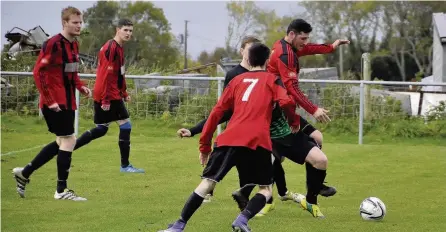  ??  ?? Bro Goronwy’s Graham Jones battles for the ball against Bethesda Picture: Paul Scholes