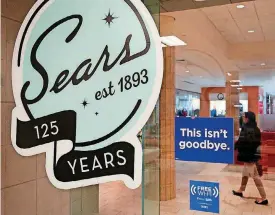  ?? [AP PHOTO] ?? In this Nov. 2 photo, a sign in the window at Sears promises that “This isn’t goodbye,” at the Livingston Mall in Livingston, N.J.