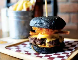  ??  ?? Facing page: activated charcoal in a face mask and a bagel. This page: charcoal ice cream; a charcoal burger bun; and Wow Body Cleanse