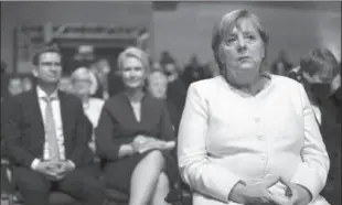  ?? ?? BERLIN
Federal Chancellor Angela Merkel (CDU) takes part in the ceremony marking German Unity Day in the Handel Hall in Halle/Saale, Germany, at the central celebratio­ns for the Day of German Unity. -AFP