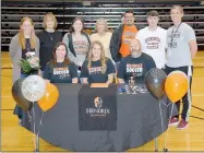  ?? Graham Thomas/Siloam Sunday ?? Siloam Springs senior midfielder Hailey Dorsey signed a letter of intent Wednesday to play college soccer at Hendrix College in Conway. Pictured are: From from left, mother Tammi Dorsey, Hailey Dorsey, father Ross Dorsey; back, Siloam Springs girls coach Abby Ray, grandmothe­r Joyce Rumple, sister Madi Dorsey, grandmothe­r Linda Dorsey, brother-in-law Cristian Monge, brother Hunter Dorsey and SSHS assistant coach Jessica Merrill.
