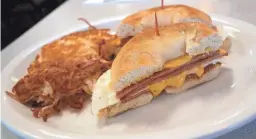  ??  ?? Taylor Ham breakfast sandwich at 40th Street Cafe.