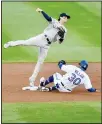  ??  ?? New York Yankees second baseman Tyler Wade (left), forces out Toronto Blue Jays’ Jonathan Villar (30) at second and throws to first on a ball hit by Caleb Joseph, who was safe during the second inning of a baseball game in Buffalo, NY
on Sept 9. (AP)