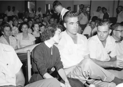  ?? AP FILE ?? Carolyn Bryant rests her head on husband Roy Bryant’s shoulder after testifying in his 1955 trial for the murder of Emmett Till.