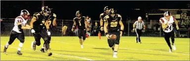  ?? MARK HUMPHREY ENTERPRISE-LEADER ?? Scramble for the football. Prairie Grove senior Dustin Burton pursues a punt blocked by teammate Isaac Disney with Pea Ridge punter Robby Pickthall also in the chase. Burton recovered for the Tigers during Prairie Grove’s 42-21 Homecoming win Friday.