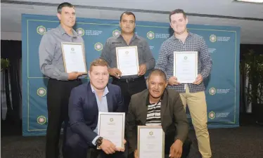  ??  ?? AUXILIARY Law Enforcemen­t Service members with their certificat­es at the awards ceremony. At the back are Stephen Sherry, Damien Allen and Kyle McCahon, and in front are Jon-Jeffray Pennett and Ridwaan Nero.