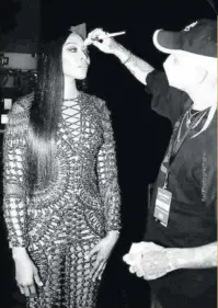  ?? Photos: (IG: @patmcgrath­labs) ?? Make-up artist Daniel Sallstrom adds finishing touches moments before Naomi Campbell hit the runway.