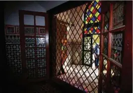  ?? PICTURES BY RIZAUDDIN IBRAHIM ?? FROM LEFT: Colourful stained glass adorned the court of Bou Ahmed’s wife private apartment in Bahia Palace; Arched passage through the walls of Kasbah in Medina of Marrakesh.