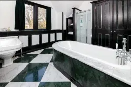  ??  ?? The Art Deco bathroom, above, and open fireplaces, above right, highlight dome of the key properties of a Leiper house