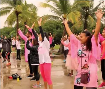  ?? ?? Participan­ts doing zumba exercises as part of the Pink Walk in 2018.