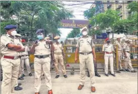  ?? PTI ?? Assam security personnel stand vigil outside the Mizoram House in Guwahati on July 29.