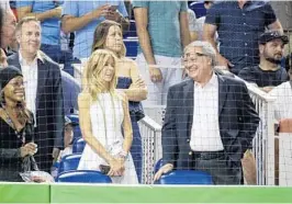  ?? LYNNE SLADKY/AP ?? Marlins owner Jeffrey Loria, right, at Tuesday’s All-Star Game, is asking $1.2 billion. Jorge Mas, left, has offered $1.17 billion. “We’re working hard, working hard,” he said.