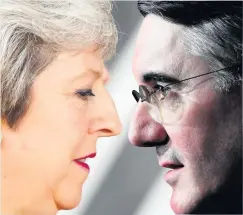  ??  ?? AT ODDS May and Brexiteer plotter Rees-Mogg. Picture: Reuters
