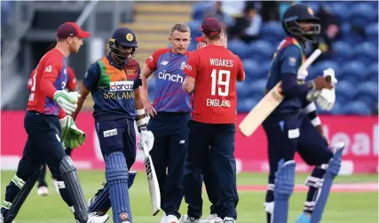  ?? Picture: Julian Finney/Getty Images ?? Sam Curran of England takes the last Sri Lankan wicket of Dasun Shanaka on the innings’ last ball during last night’s first T20 Internatio­nal Series match at Sophia Gardens in Cardiff