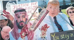  ?? JIM WATSON AFP/GETTY IMAGES ?? Demonstrat­ors outside the White House dressed as Saudi Crown Prince Mohammed bin Salman and U.S. President Donald Trump demand justice for slain Saudi journalist Jamal Khashoggi.