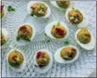  ?? CARRIE CROWDER — KATIE WORKMAN VIA AP ?? A dish of deviled eggs from a recipe by Katie Workman is shown.