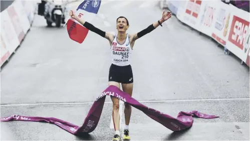  ??  ?? 0 Christelle Daunay of France, crossing the line to win the women’s marathon at the 2014 European Championsh­ips, is one of the runners seeking damages as former IAAF president Lamine Diack and son Papa Massata face charges of corruption at a trial in Paris.