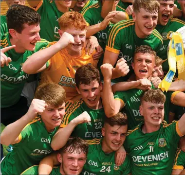  ??  ?? Meath captain Matthew Costello and his teammates celebrate with the Murray Cup after their Electric Ireland