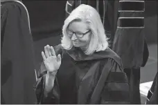  ?? JACK DEMPSEY/AP PHOTO ?? Former U.S. Rep. Liz Cheney, R-Wyo., waves before delivering the commenceme­nt address Sunday at Colorado College in Colorado Springs, Colo.