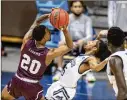  ?? DOUG MCSCHOOLER/ AP ?? Texas Southern guard Michael Weathers ( 20) drives the ball into the defense of Mount St. Mary’s guard Damian Chong Qui during the second half of their First Four game Thursday.