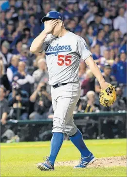  ?? Wally Skalij Los Angeles Times ?? DODGERS RELIEVER Joe Blanton leaves the mound after giving up back-toback home runs in the eighth inning, including Miguel Montero’s grand slam.