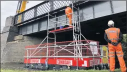  ??  ?? ■ The first of the restored side panels is installed. Photo courtesy. Friends of the Great Central Main Line.