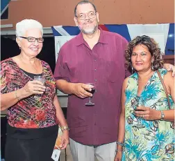  ??  ?? From left: Wendy Hart, UWI Western Jamaica Campus ambassador­s Richard Ferdinand and Kathryn May pose for the camera at the launch.