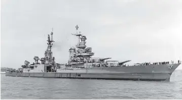  ?? U.S. NAVY VIA AP ?? The USS Indianapol­is, pictured on July 10, 1945 in Northern California, after repairs from combat damage. Just 20 days later it would be hit by torpedoes from a Japanese submarine in the Philippine Sea and sink.