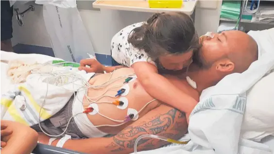  ??  ?? Jarred Thompson didn’t take his eyes off his daughter Maddison Thompson, 6, after the pair were reunited at Auckland City Hospital, according to a friend.