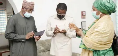  ?? ?? L-R: Lamido Yuguda, director general, Securities and Exchange Commission (SEC); Phillip Shaibu, deputy governor, Edo State; and Zainab Ahmed, minister of finance, budget, and national planning, during the coronation of Clem Ikanade Agba, minister of state for budget and national planning, as Ofevwosi of Uneme in Edo State in Edo State recently