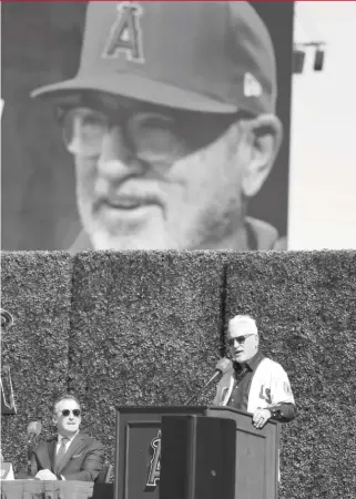  ?? GETTY IMAGES ?? Angels owner Arte Moreno looks on as Joe Maddon addresses the media during his introducti­on as the new manager of the Angels on Thursday.