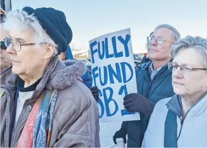  ?? CAROLE CARLSON/POST-TRIBUNE ?? Members of the Interfaith Action Network joined a statewide rally last month to support state mental health funding.