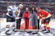  ?? PROVIDED TO CHINA DAILY ?? Beijing Kunlun Red Star (red) and Khabarovsk Amur kick start their regular season game in the Kontinenta­l Hockey League at Beijing’s LeSports Center.