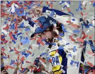  ?? GERRY BROOME — THE ASSOCIATED PRESS ?? Chase Elliott celebrates in victory lane after winning Sept. 29at Charlotte Motor Speedway in Concord, N.C.