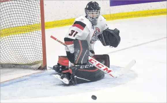  ?? KEVIN ADSHADE/THE NEWS ?? Weeks Crushers goaltender Andrew MacLeod makes the save against the Yarmouth Mariners on Tuesday.